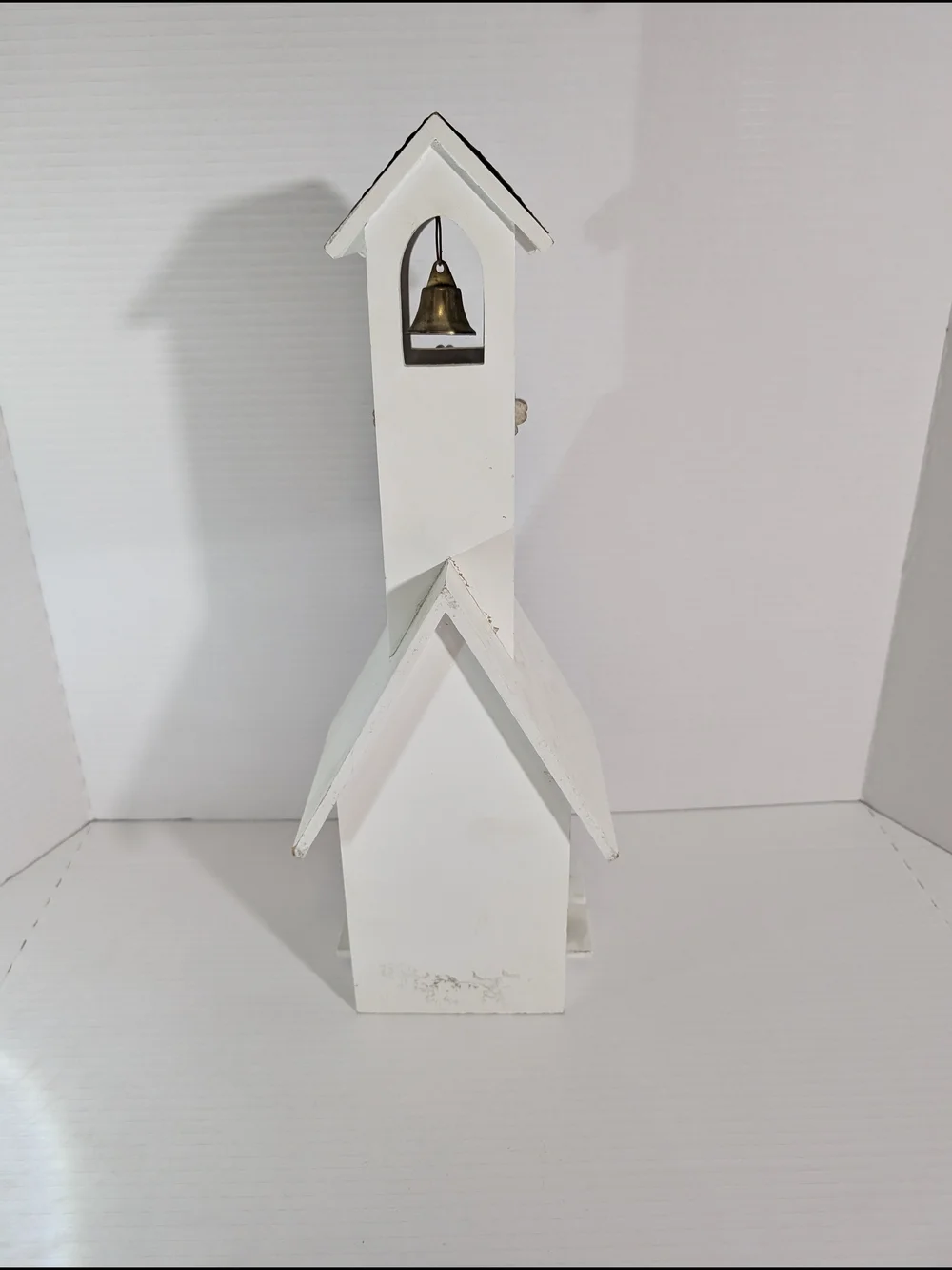 White Decorative Church Wall Accent with Bronze Cross and Bell